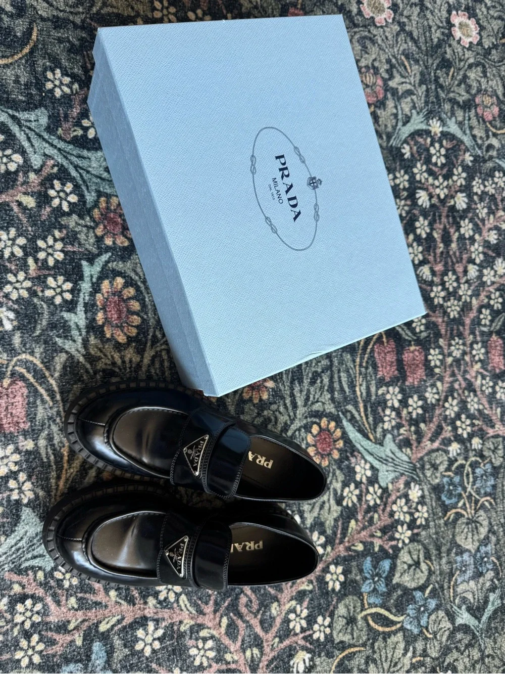 Prada Black Leather Penny Loafers with Triangular Logo